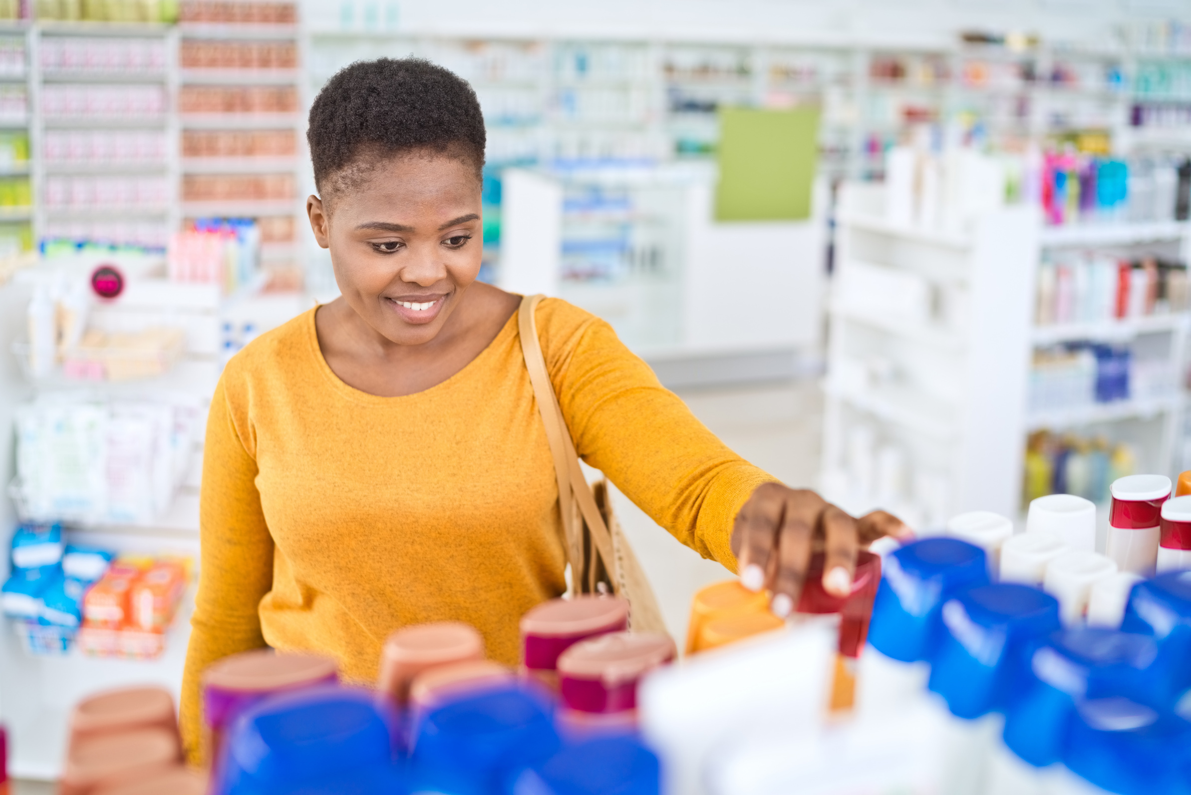 Mid adult woman doing shopping in pharamcy